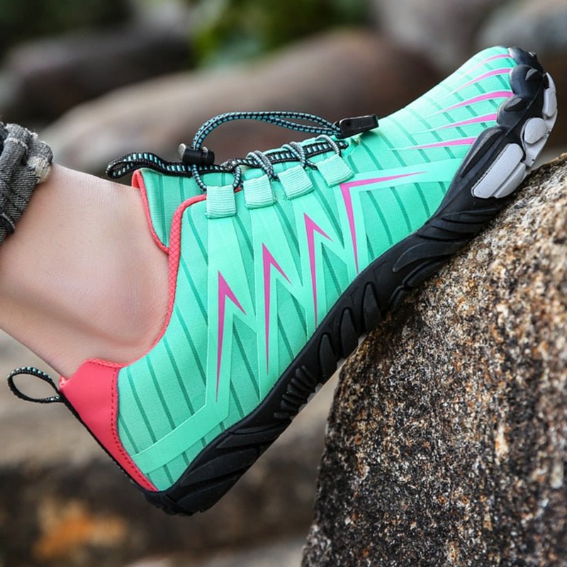 Barefoot shoes with a wide toe box that lets the toes spread, in black, gray, red and blue