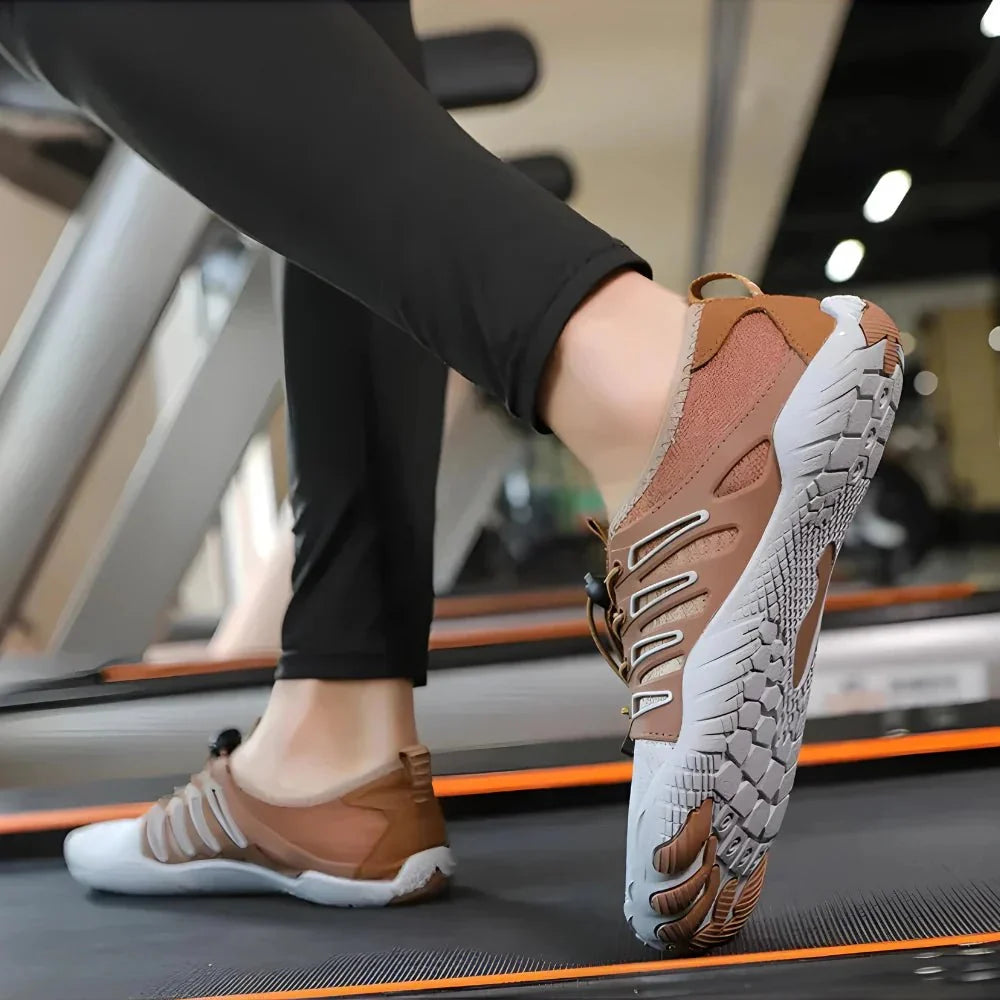 Barefoot performance shoes with a thin grippy sole and a foot-shaped toe box