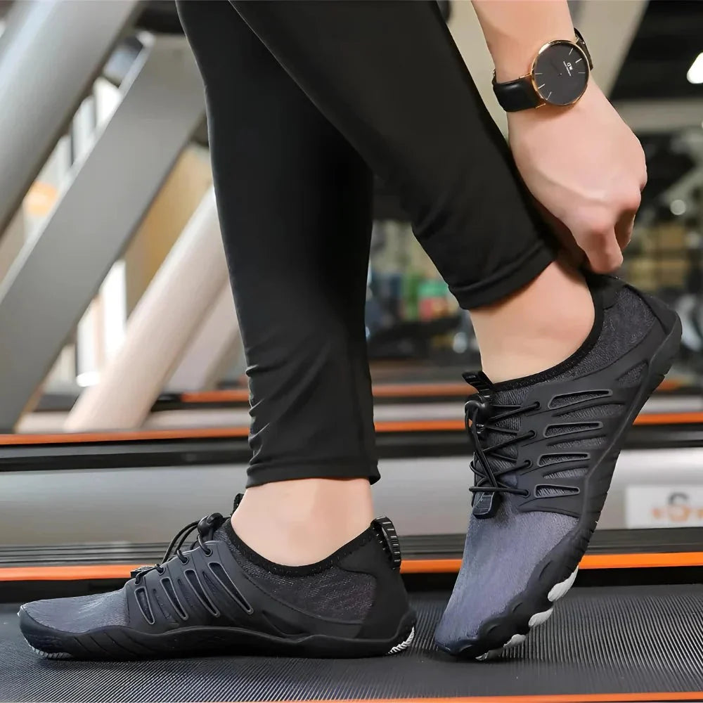 Barefoot performance shoes with a thin grippy sole and a foot-shaped toe box