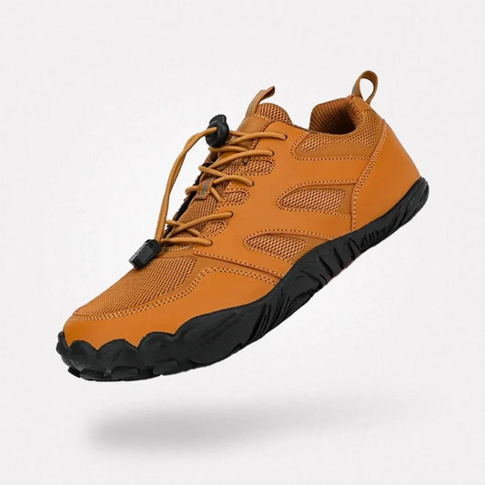 Gray barefoot hiking shoes with a grippy thin outsole and a wide toe box