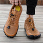 Barefoot hiking shoes with a thin flexible sole and wide toe box, in bronze, gray and black