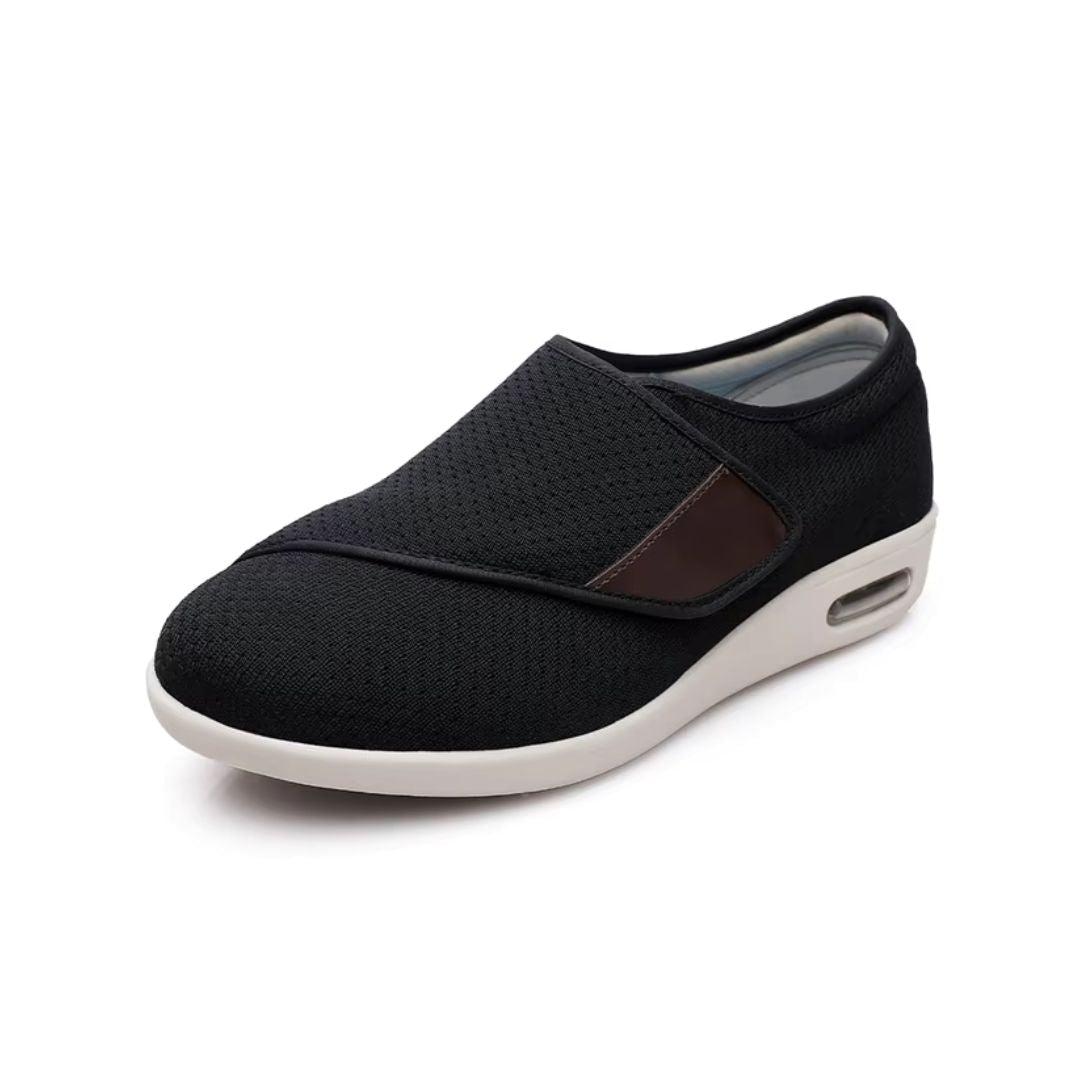 Women's orthopedic shoes closed by a hook-and-loop strap across the instep
