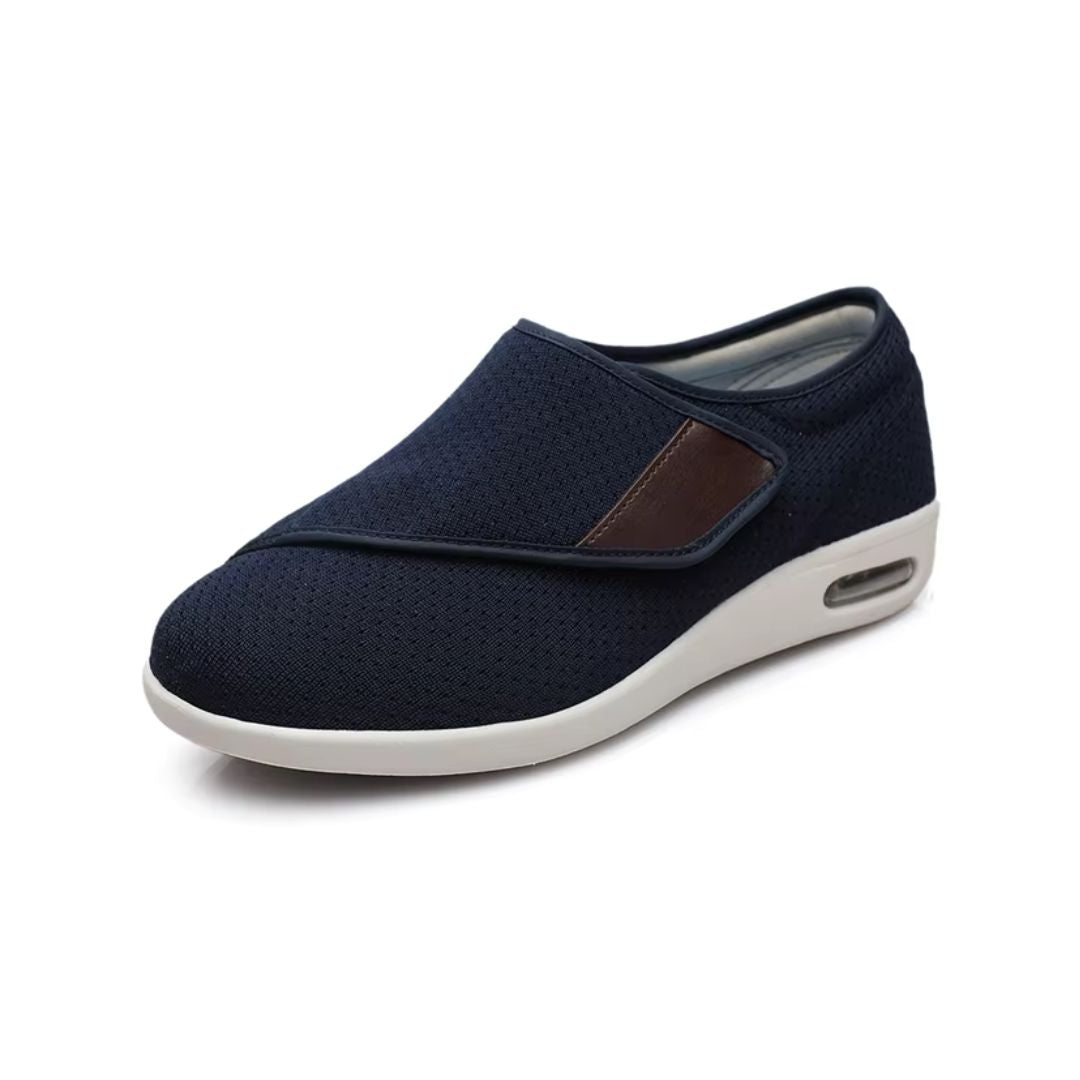 Women's orthopedic shoes closed by a hook-and-loop strap across the instep
