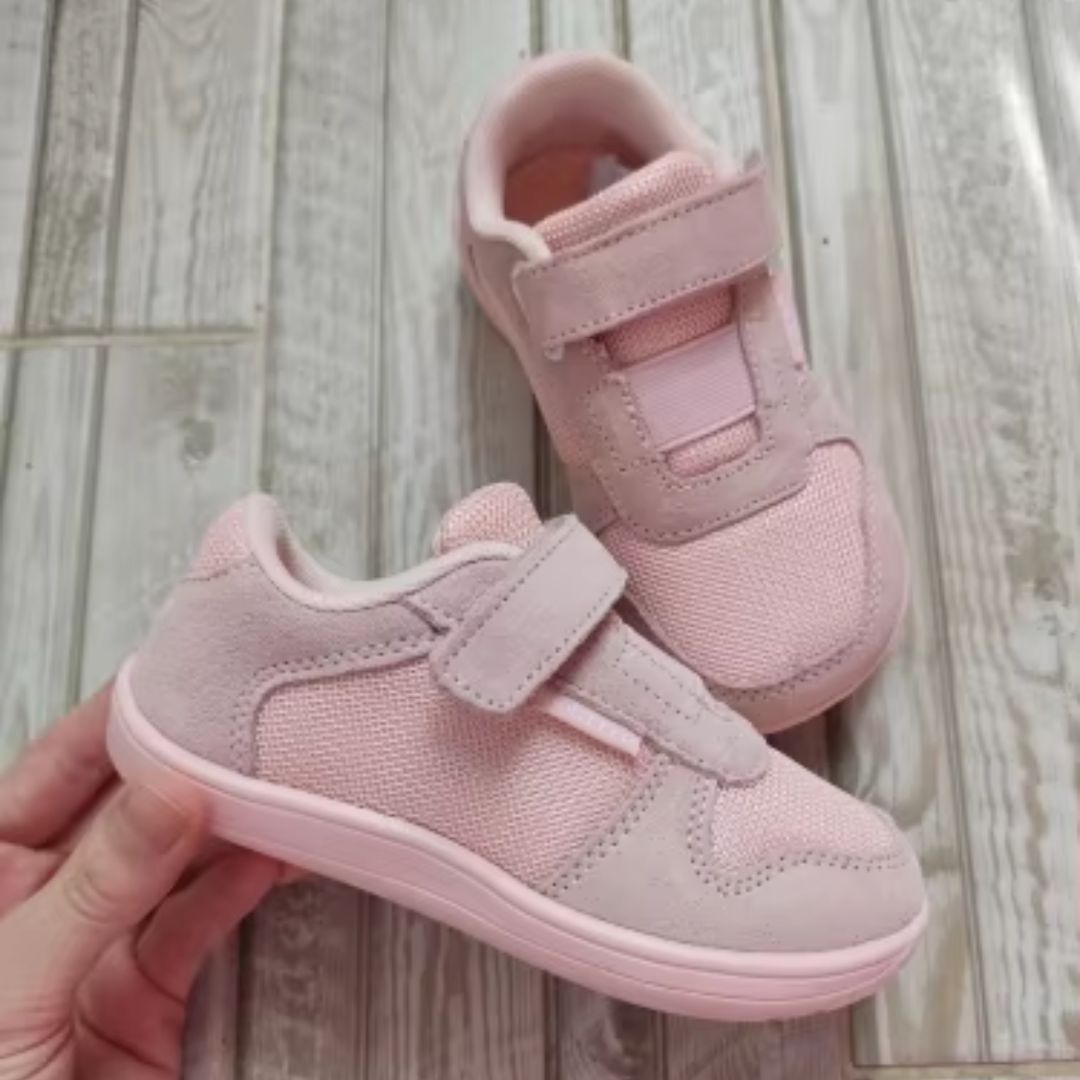 Blue barefoot shoes for kids with a thin flexible sole and a roomy toe box