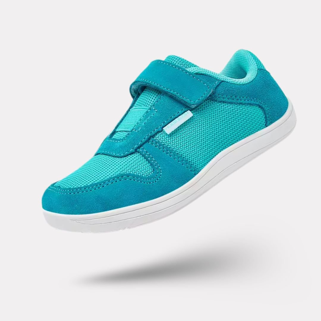 Blue barefoot shoes for kids with a thin flexible sole and a roomy toe box