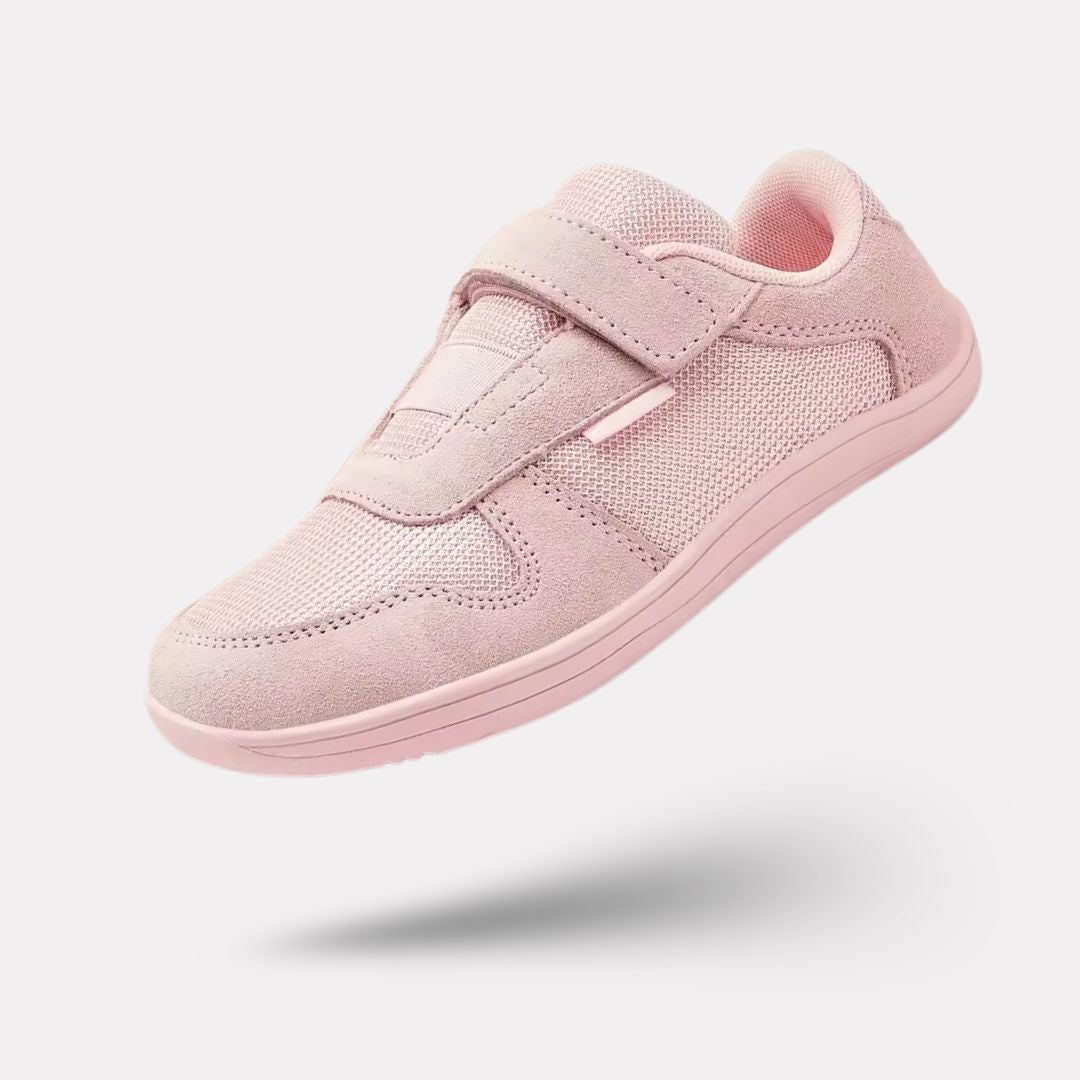 Blue barefoot shoes for kids with a thin flexible sole and a roomy toe box