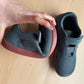 Blue barefoot shoes for kids with a thin flexible sole and a roomy toe box