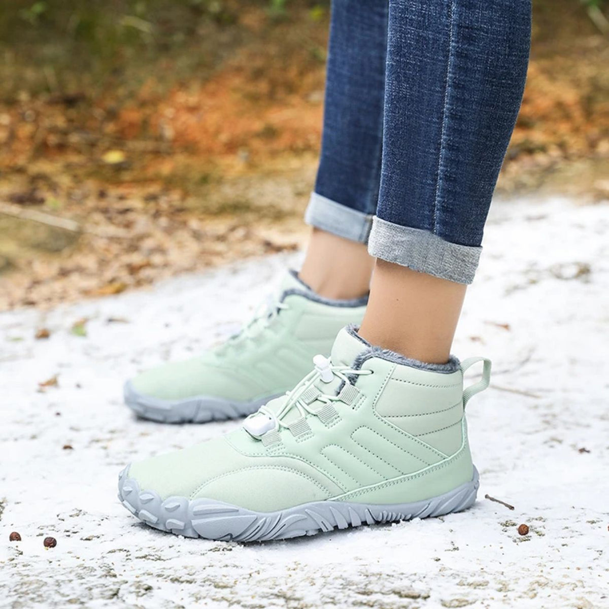 Green winter barefoot shoes with a lined upper and a flat wide toe box
