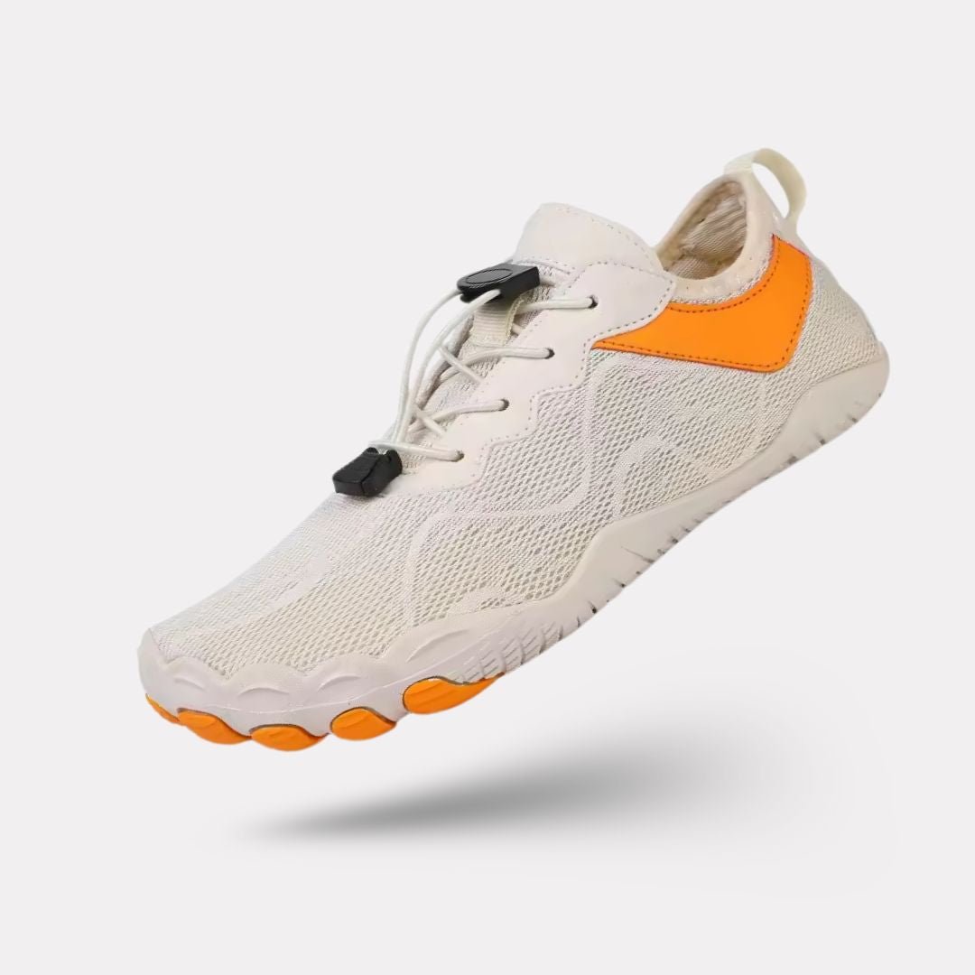 Light gray minimalist barefoot sneakers with a flat sole and a wide toe box