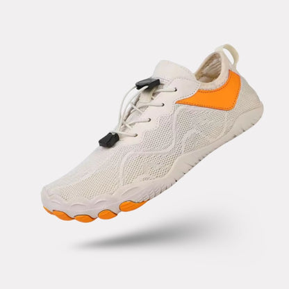 Light gray minimalist barefoot sneakers with a flat sole and a wide toe box