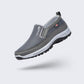 Black orthopedic walking shoes for men with a cushioned midsole and lace-up fit