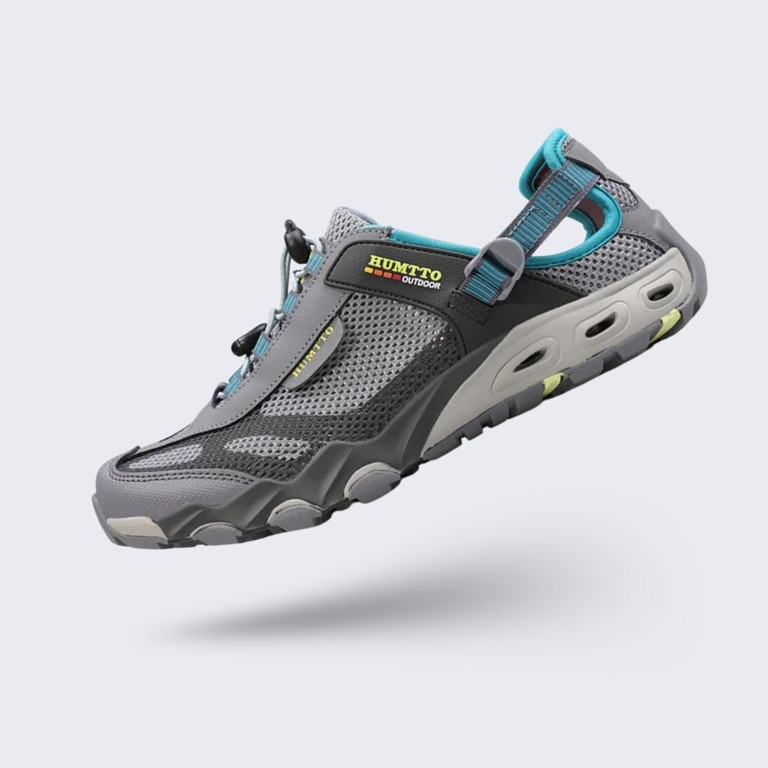 Water hiking shoes with a lugged rubber outsole and draining mesh upper, in black, gray or blue