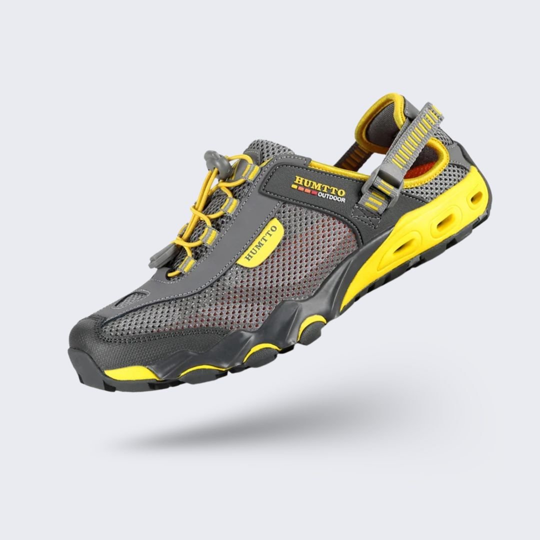 Water hiking shoes with a lugged rubber outsole and draining mesh upper, in black, gray or blue