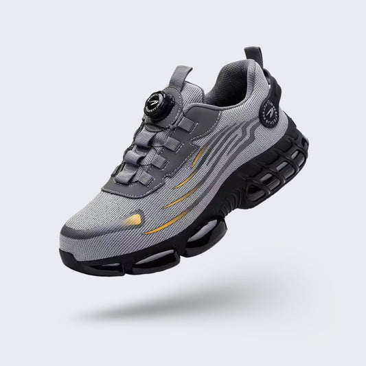 Lightweight women's safety shoes in gray and black with a reinforced protective toe cap
