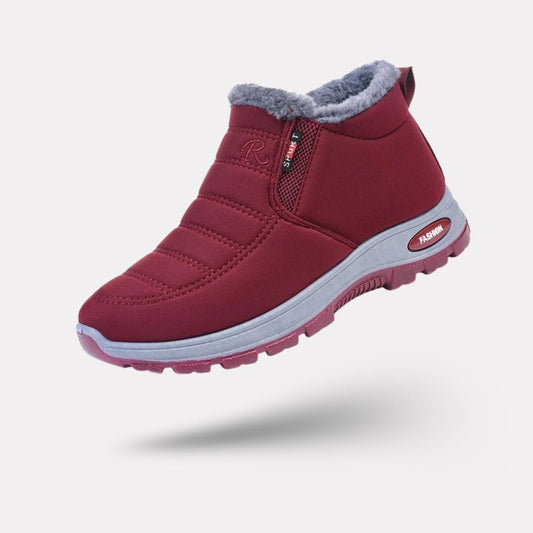 Red winter shoes for women with a warm lining and an easy slip-on fit