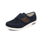 Black wide orthopedic shoes with hook-and-loop straps across the instep