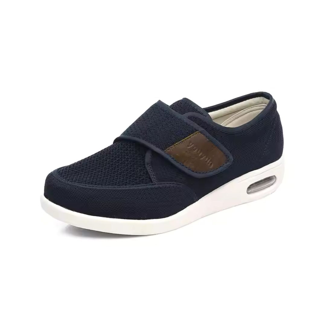 Black wide orthopedic shoes with hook-and-loop straps across the instep