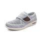 Black wide orthopedic shoes with hook-and-loop straps across the instep