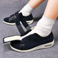 Orthopedic shoes with a wide hook-and-loop strap across the instep for easy slip-on