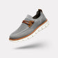 Gray casual orthopedic shoes for men with a lace-up front and thick cushioned sole