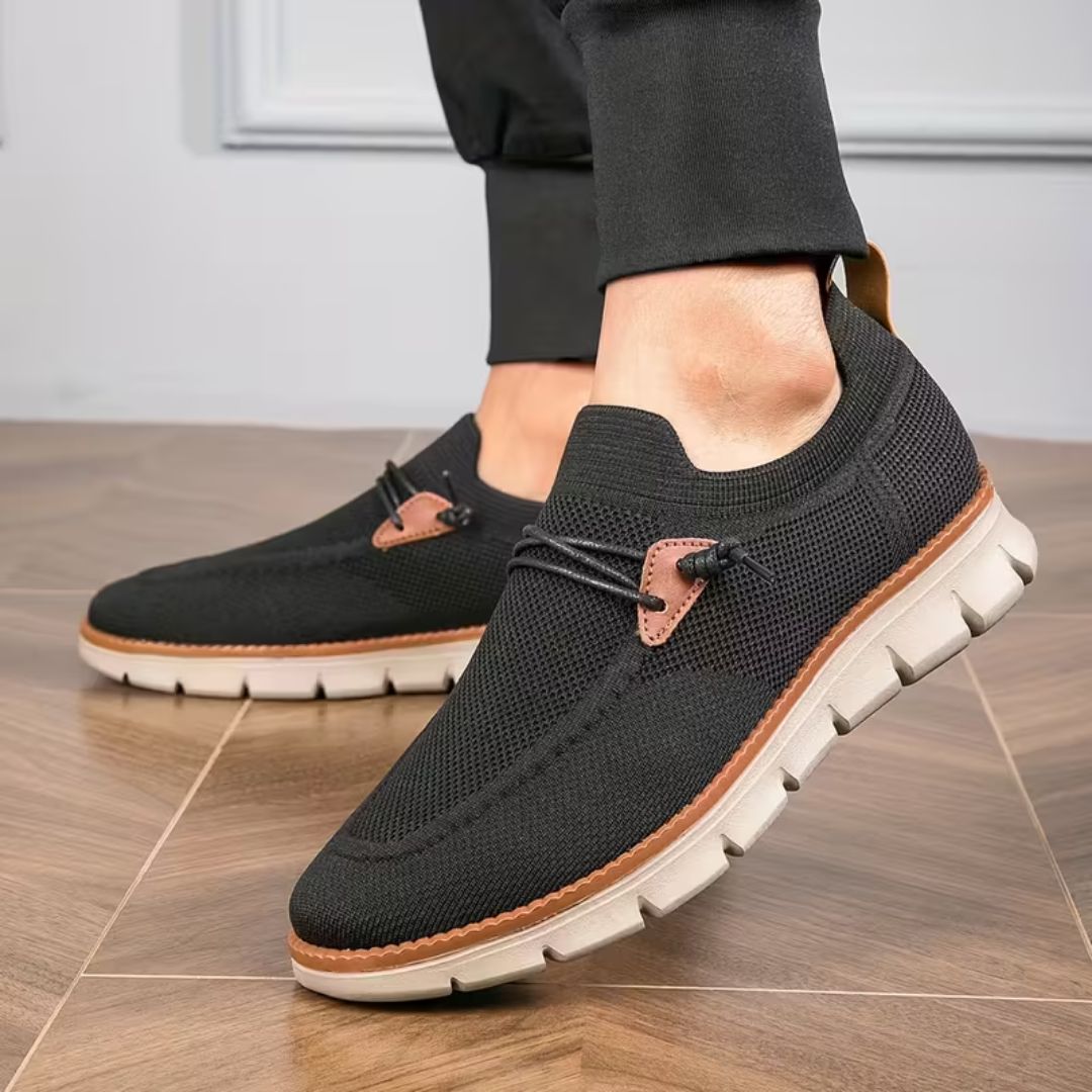 Gray casual orthopedic shoes for men with a lace-up front and thick cushioned sole