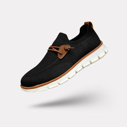 Gray casual orthopedic shoes for men with a lace-up front and thick cushioned sole