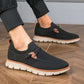 Gray casual orthopedic shoes for men with a lace-up front and thick cushioned sole