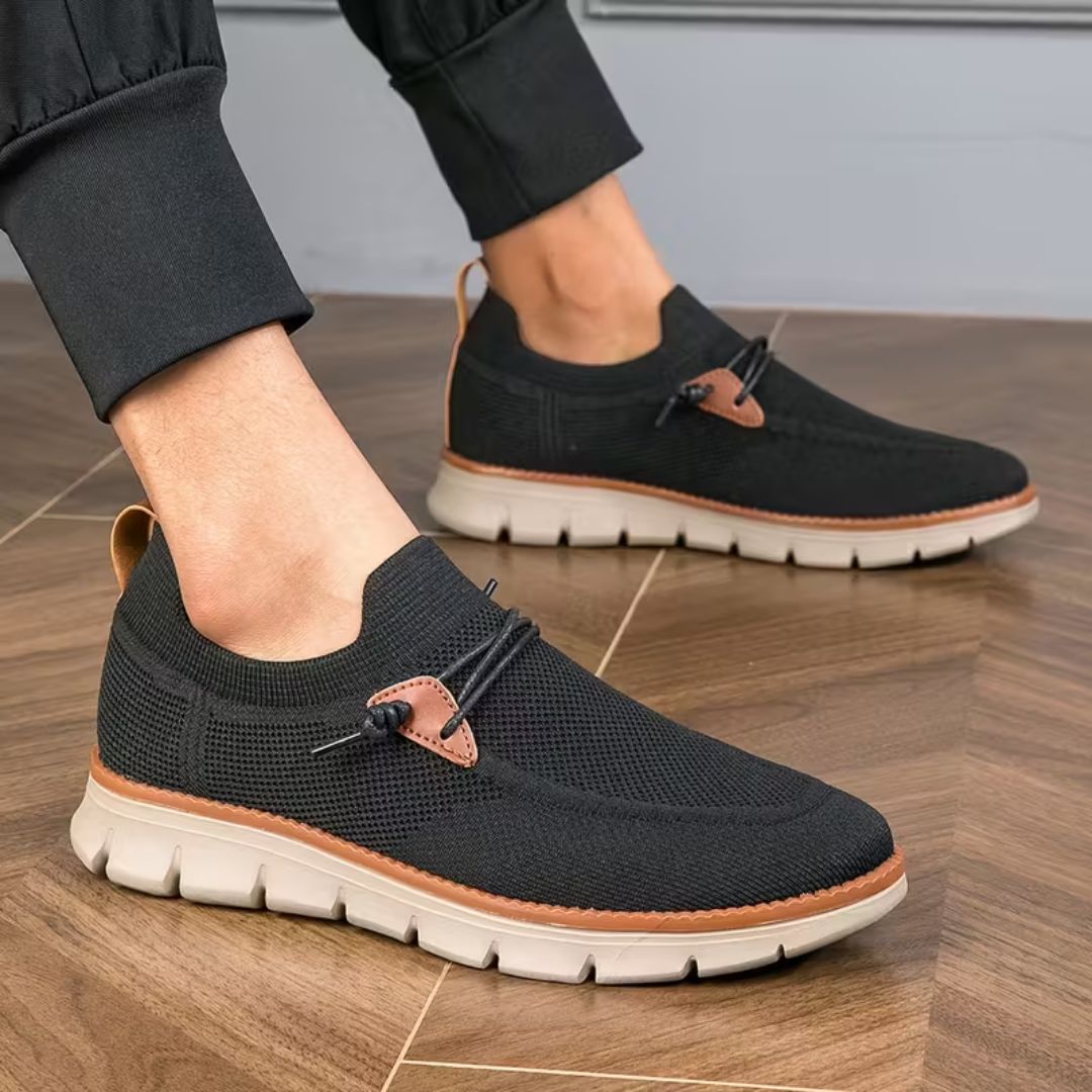 Gray casual orthopedic shoes for men with a lace-up front and thick cushioned sole