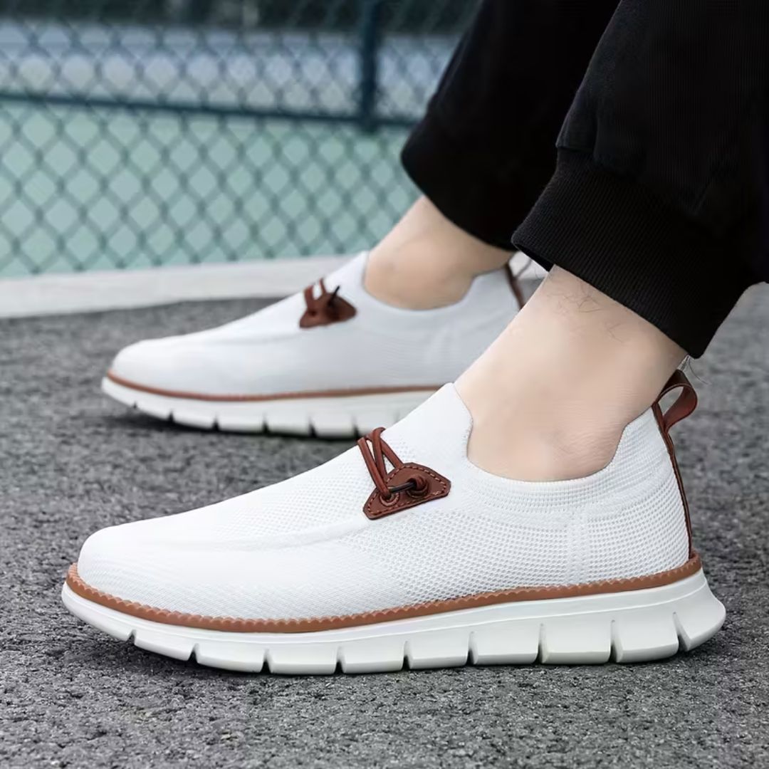 Gray casual orthopedic shoes for men with a lace-up front and thick cushioned sole