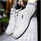 Men's orthopedic dress shoes in gray, white and black with a cushioned sole