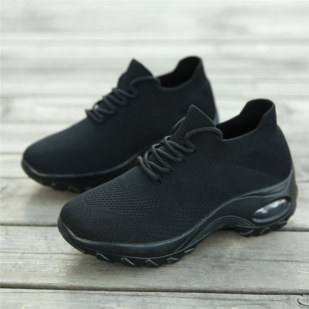 Women's orthopedic comfort shoes with a cushioned midsole, in black, white, gray and pink
