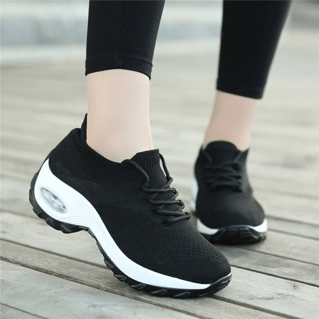 Women's orthopedic comfort shoes with a cushioned midsole, in black, white, gray and pink