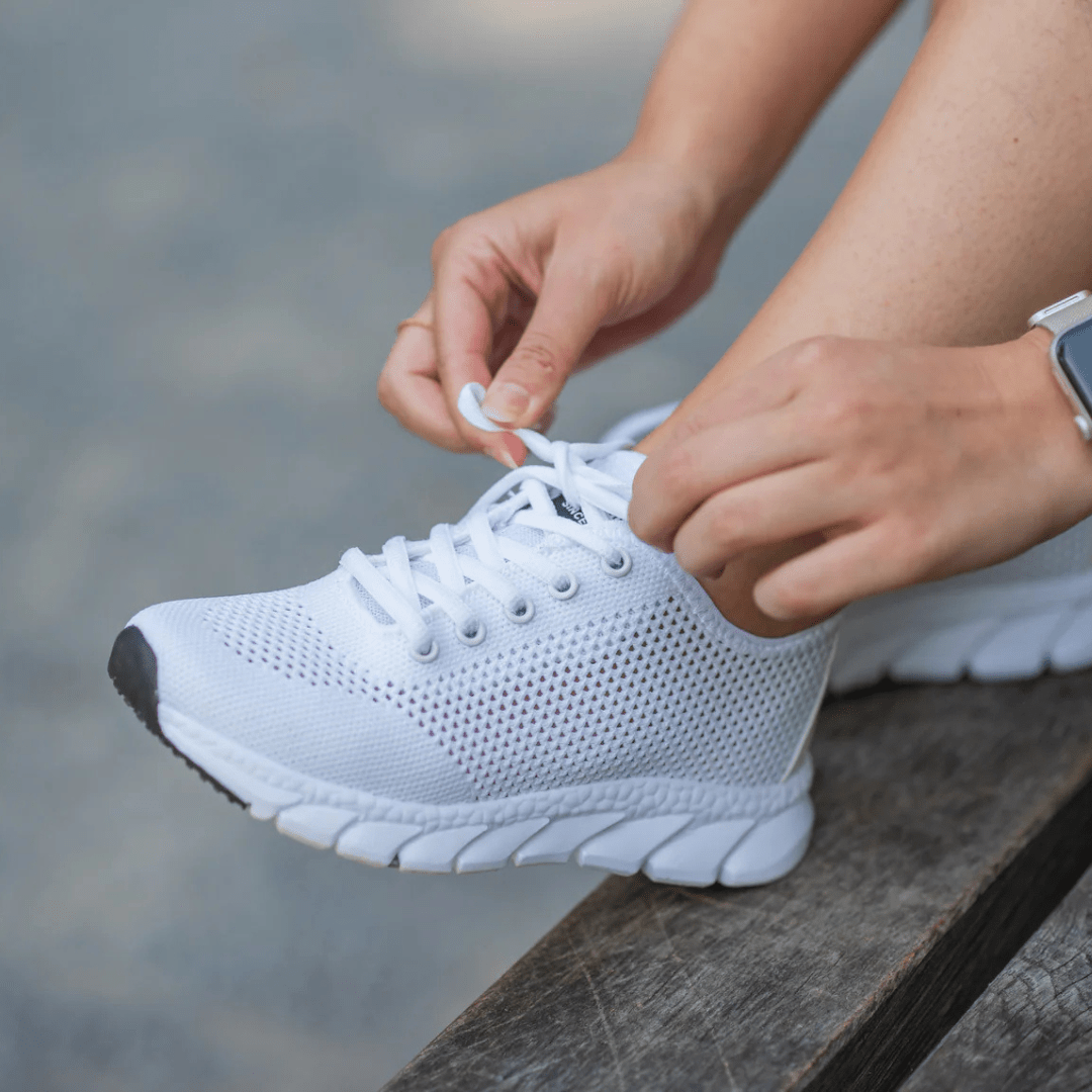 Breathable orthopedic shoes with a knit mesh upper, in black, white and pink