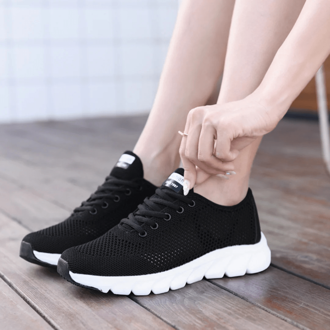 Breathable orthopedic shoes with a knit mesh upper, in black, white and pink
