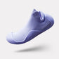 Soft barefoot style orthopedic shoes with a thin flexible sole, in gray, black, white or purple