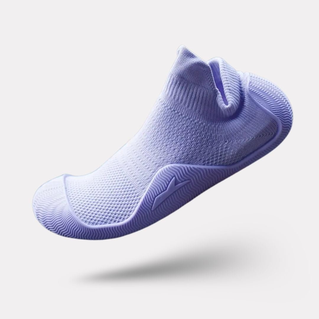 Soft barefoot style orthopedic shoes with a thin flexible sole, in gray, black, white or purple