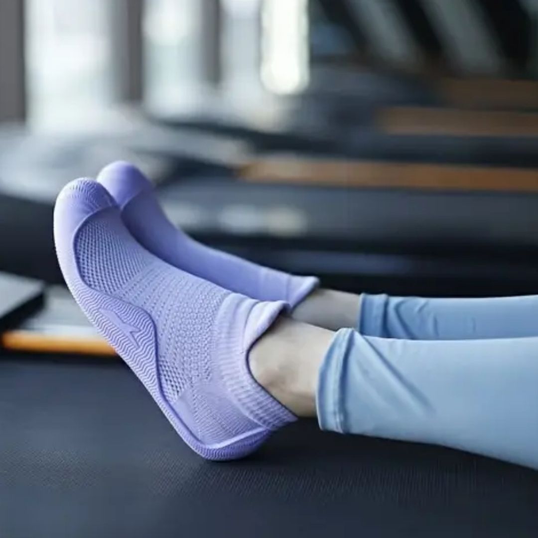 Soft barefoot style orthopedic shoes with a thin flexible sole, in gray, black, white or purple
