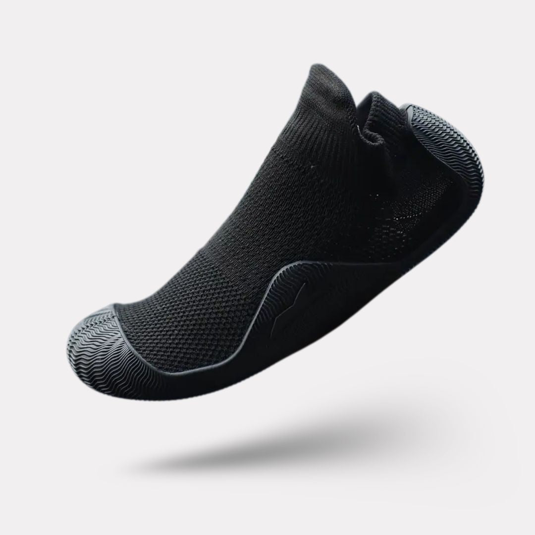 Soft barefoot style orthopedic shoes with a thin flexible sole, in gray, black, white or purple