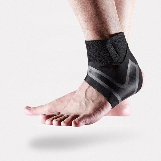 Ankle support brace in gray or white, wrapped around the ankle and closed with straps