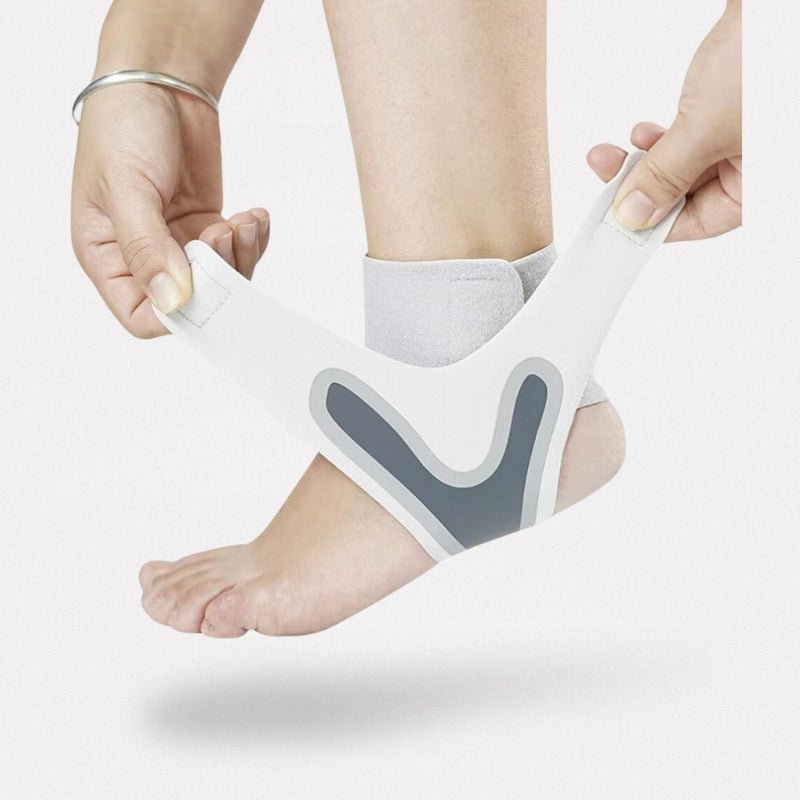 White ankle brace with crossed straps wrapped around a weak ankle