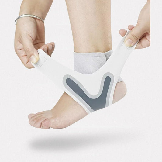 White ankle brace with crossed straps wrapped around a weak ankle