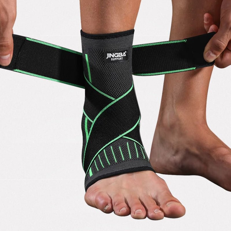 Gray compression ankle brace that wraps the heel and supports the arch