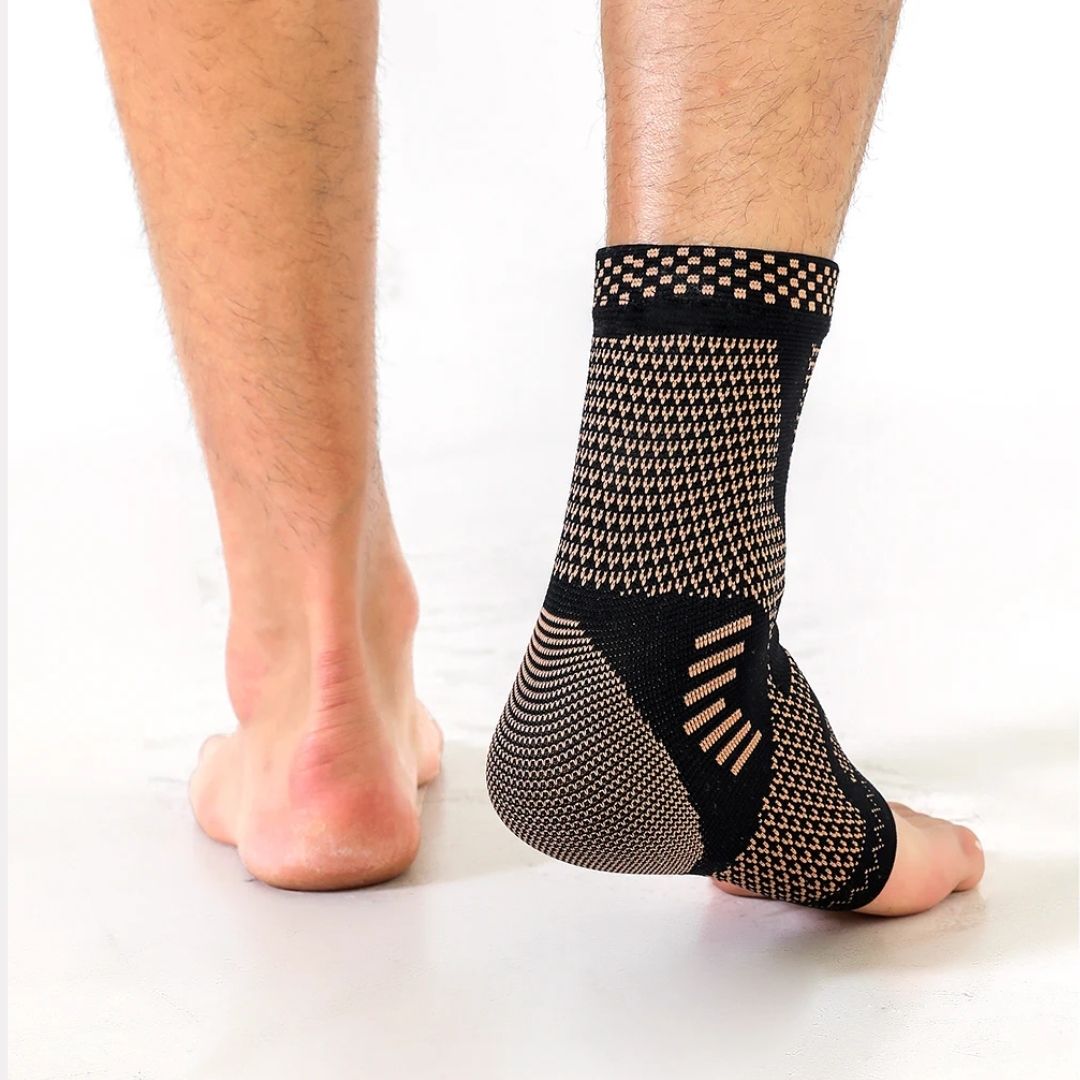 Copper infused compression sleeve pulled on around the ankle