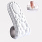 Pair of orthopedic insoles with layered cushioning under the heel and arch