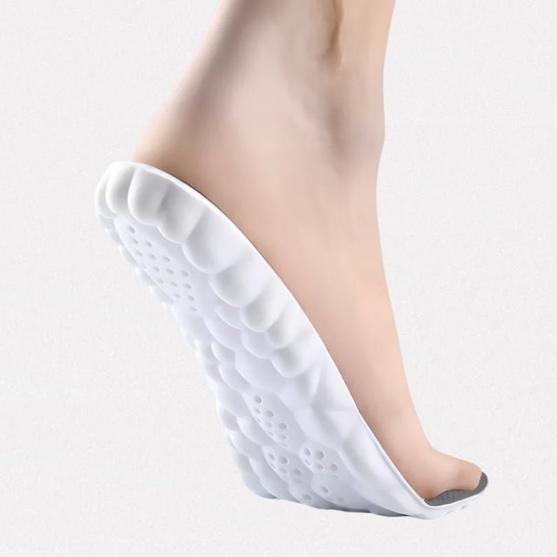Pair of orthopedic insoles with layered cushioning under the heel and arch