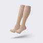 Medical compression socks rated 20 to 30 mmHg in black, white and beige, worn up to the knee