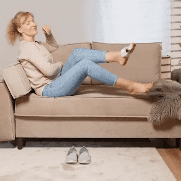 Adjustable bunion corrector strapped over the big toe joint for hallux valgus