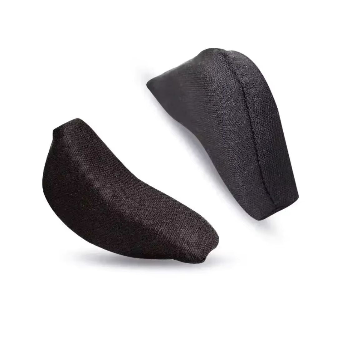 Cushions in nude and black placed under the forefoot inside high heels