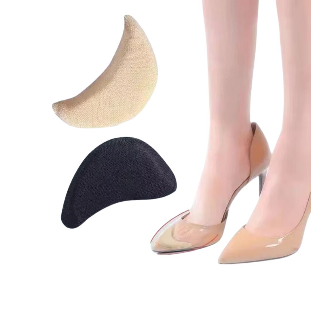 Cushions in nude and black placed under the forefoot inside high heels