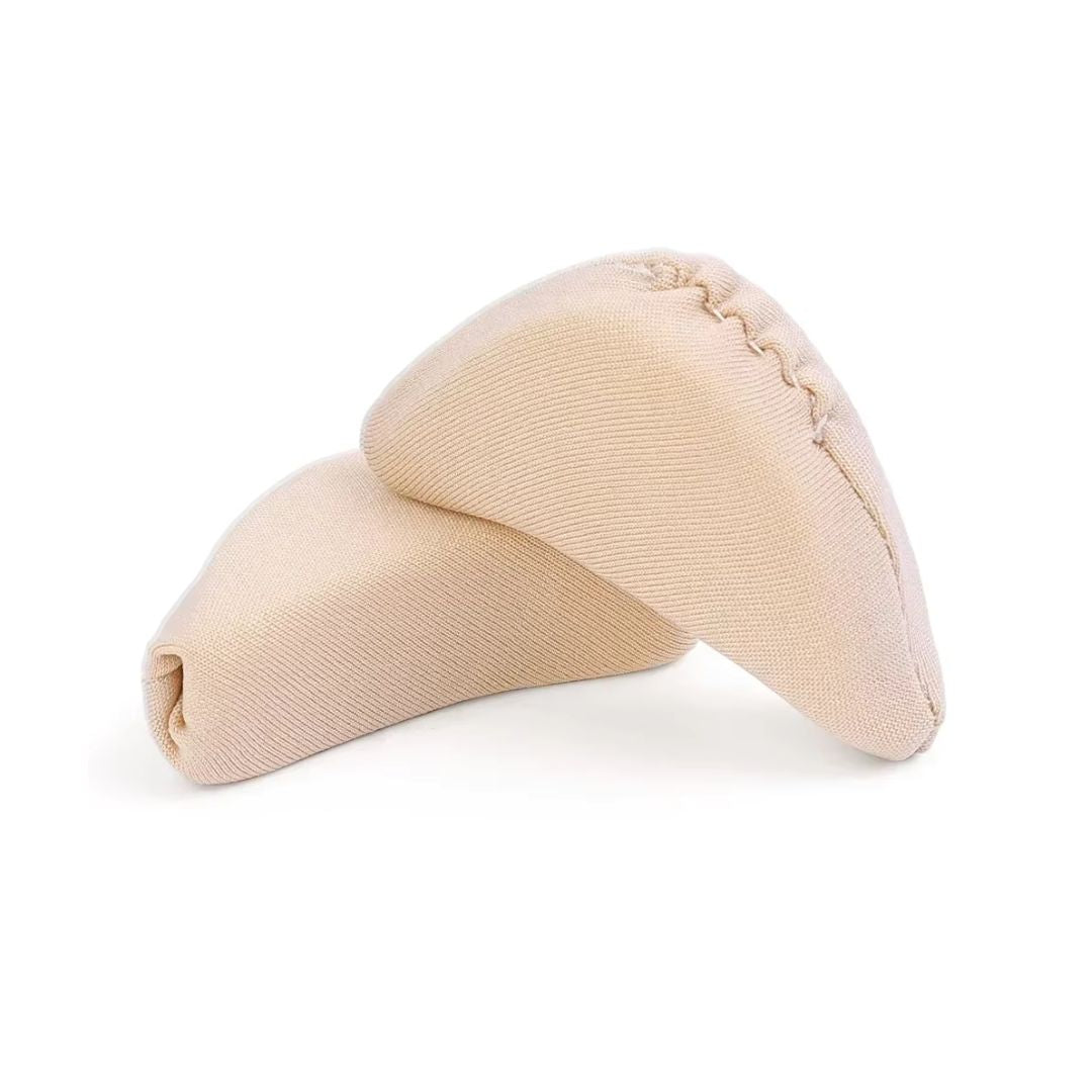 Cushions in nude and black placed under the forefoot inside high heels